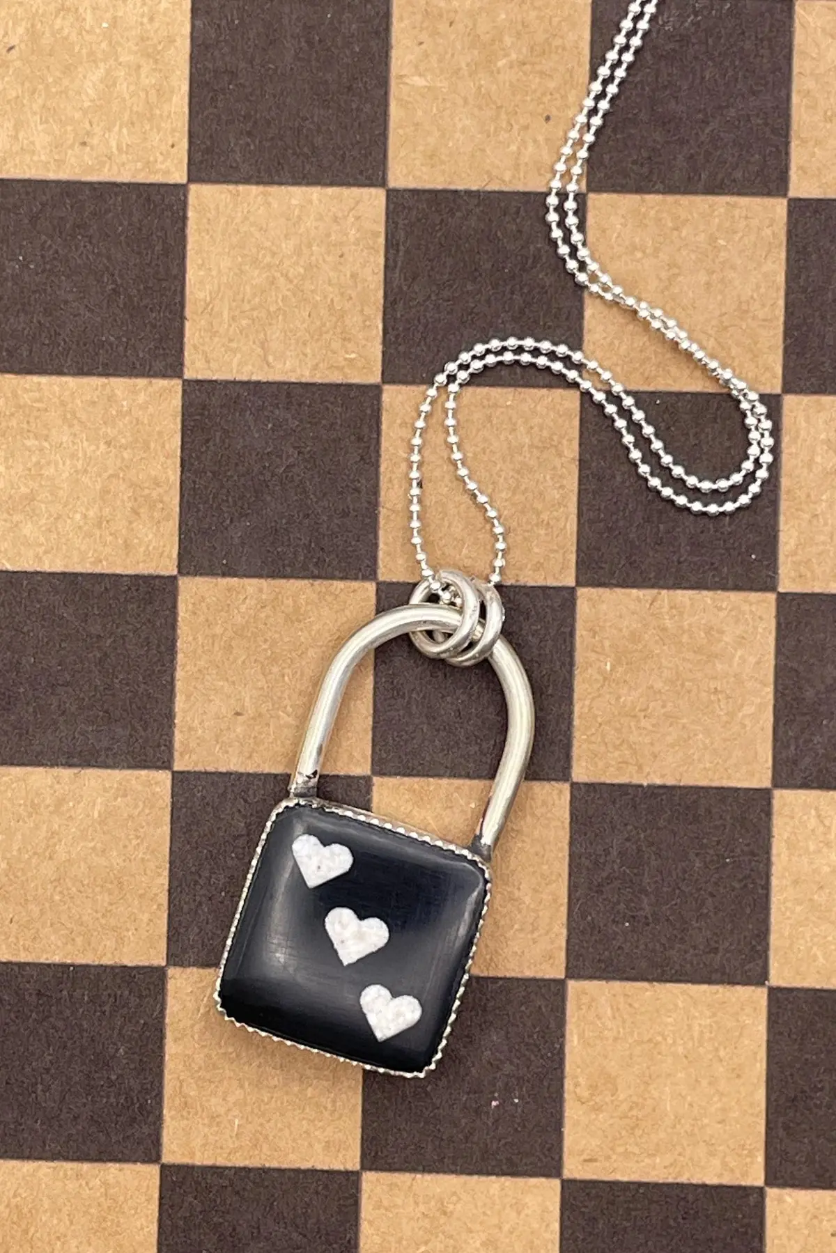 Lux - Onyx Dice With Heart Pips Faux Lock Pendant 1